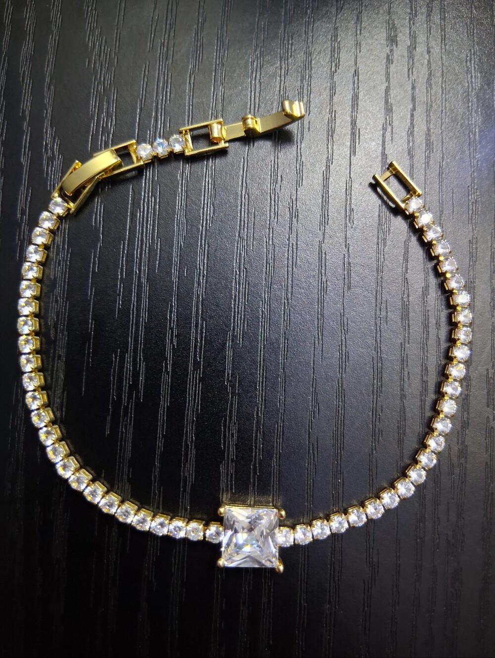 Gold-Tone Cubic Zirconia Tennis Bracelet with Square Center Stone